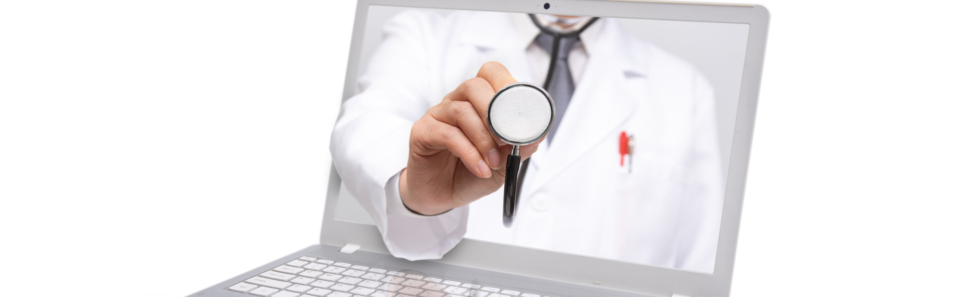 A doctor holding a stethoscope on a laptop