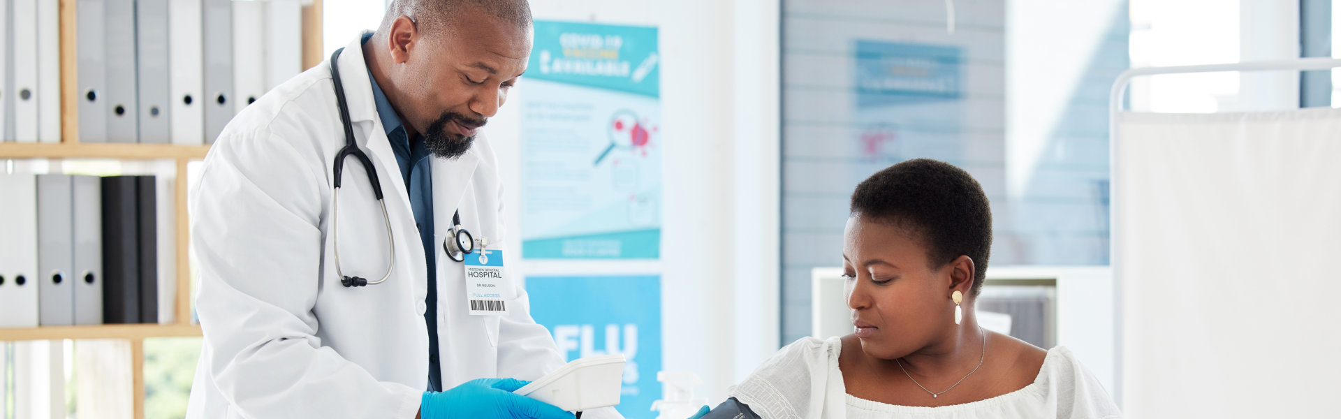 A male doctor checking the female